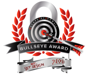 A red and silver award badge from EscapeTheRoomers honoring Aftermath with an award for Best Set Design in an Escape Room.